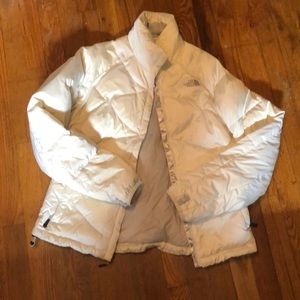White puffer North Face jacket.